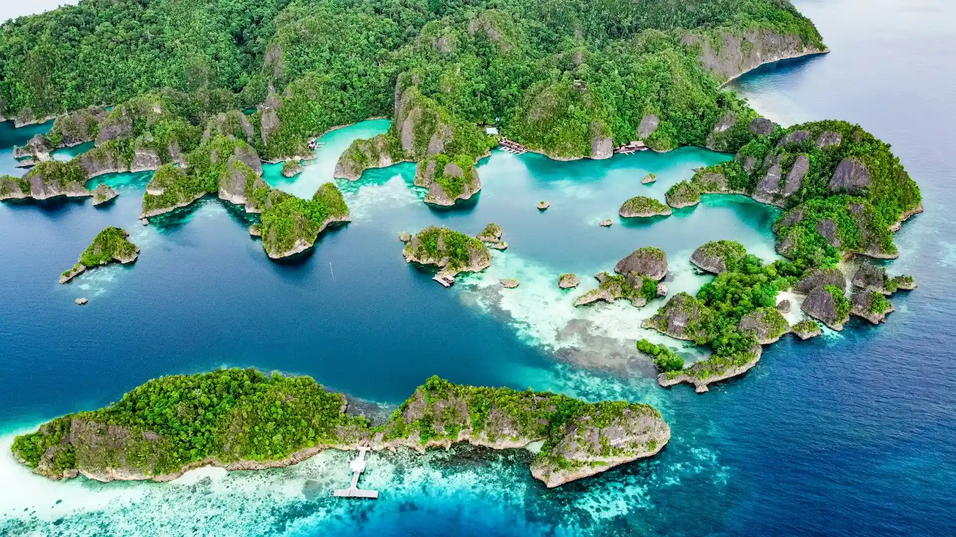Otium sailing through Raja Ampat's limestone island cluster